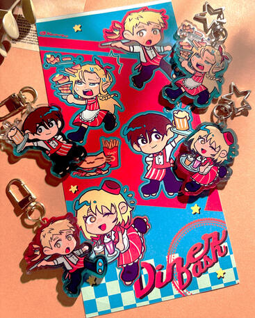 sticker sheet and keychains dungeon meshi diner dash